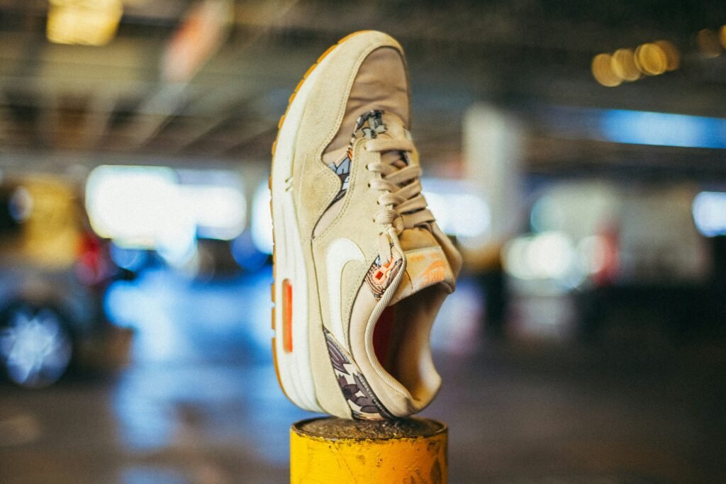 Shop the Best Hawaiian Shirts Online: Your Ultimate Destination 1 brown Nike running shoe on yellow pole